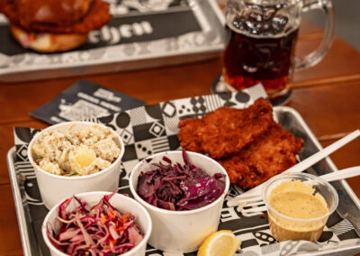 Photo - Fried chicken, coleslaw, and beer being served at the Beer Kitchen